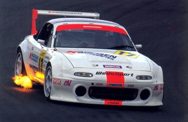 Widebody kitted Miata getting it's fire on The Human Torch would love this